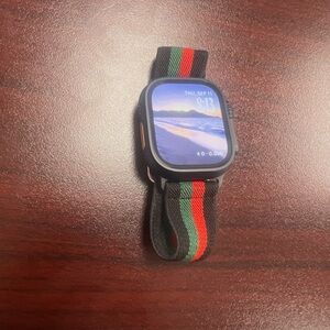 Apple Watch with Black, Red, and Green Strap